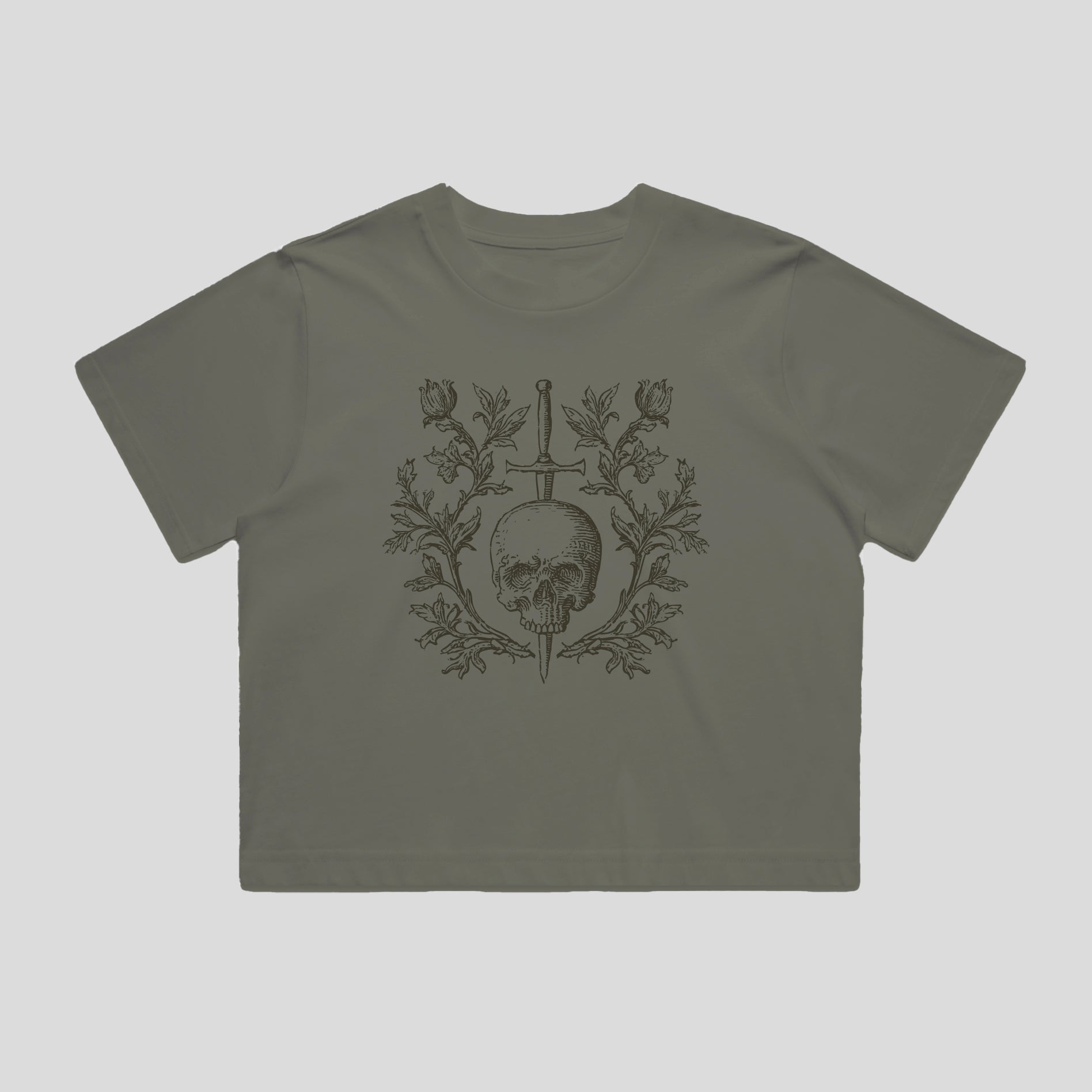 Green t-shirt with skull and crossbones design on a light gray background